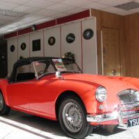 Classic Corner!!! -- 1959  MGA 1500 Roadster. Red - Black Leather Seats - Black Hood. Classic Lines.
